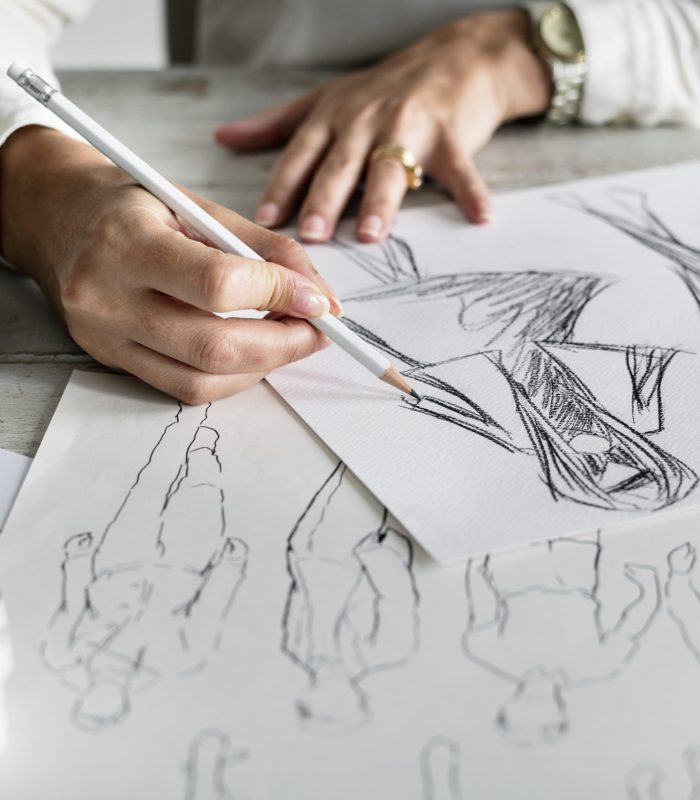 Caucasian designer creating new design